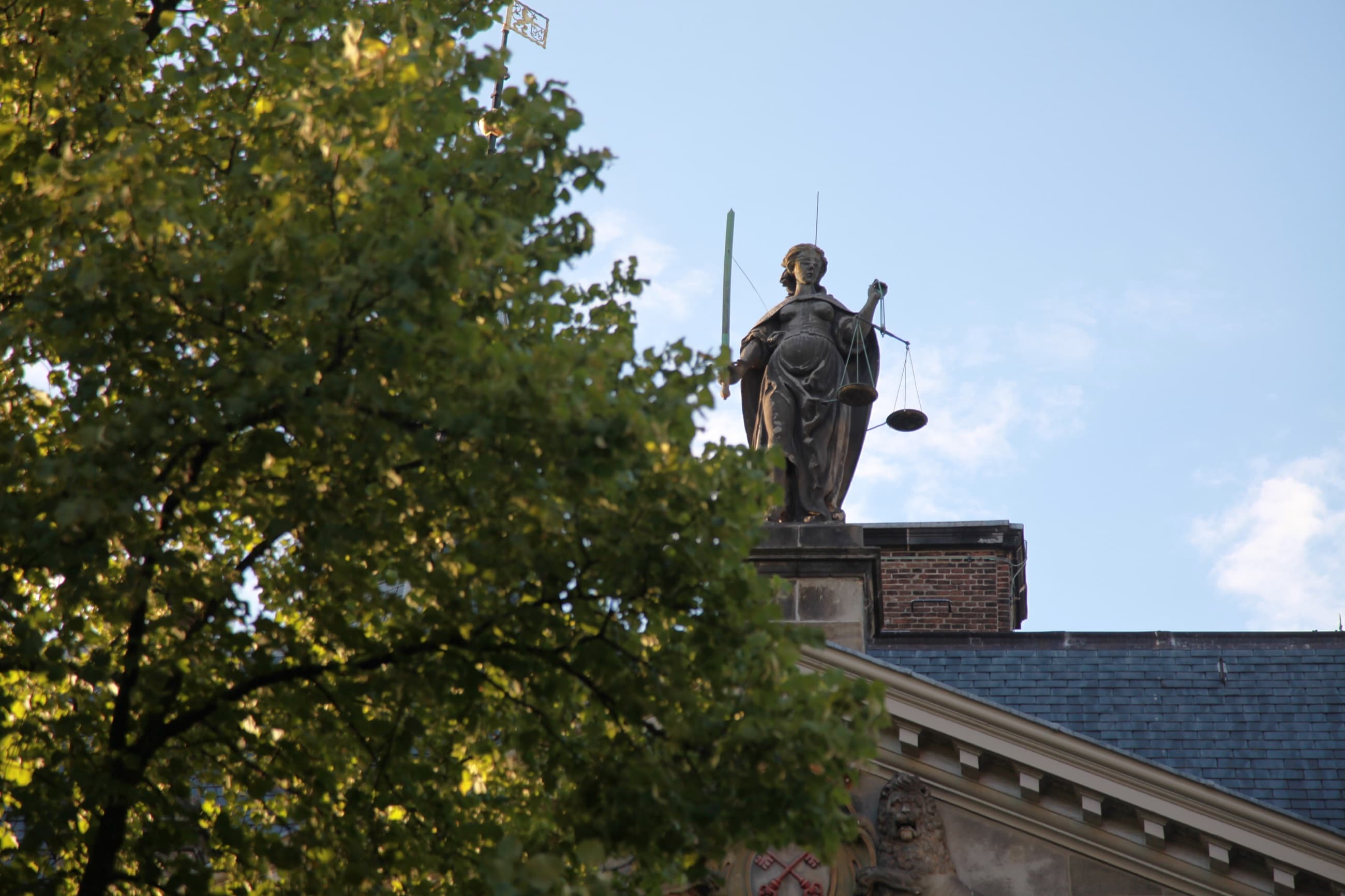 Lady Justice above the rooftops in Leiden
