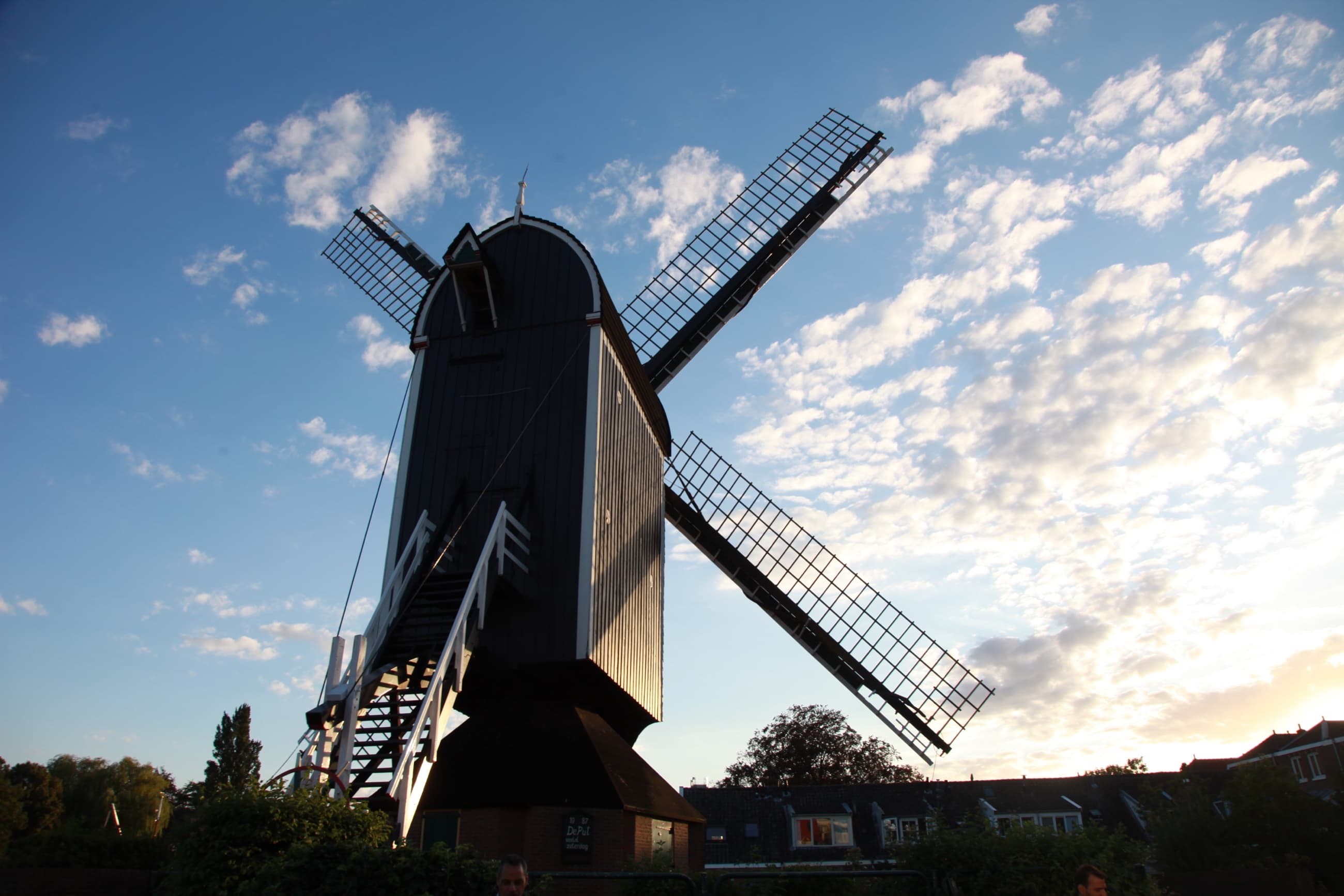 Molen De Put against a textured sky in Leiden