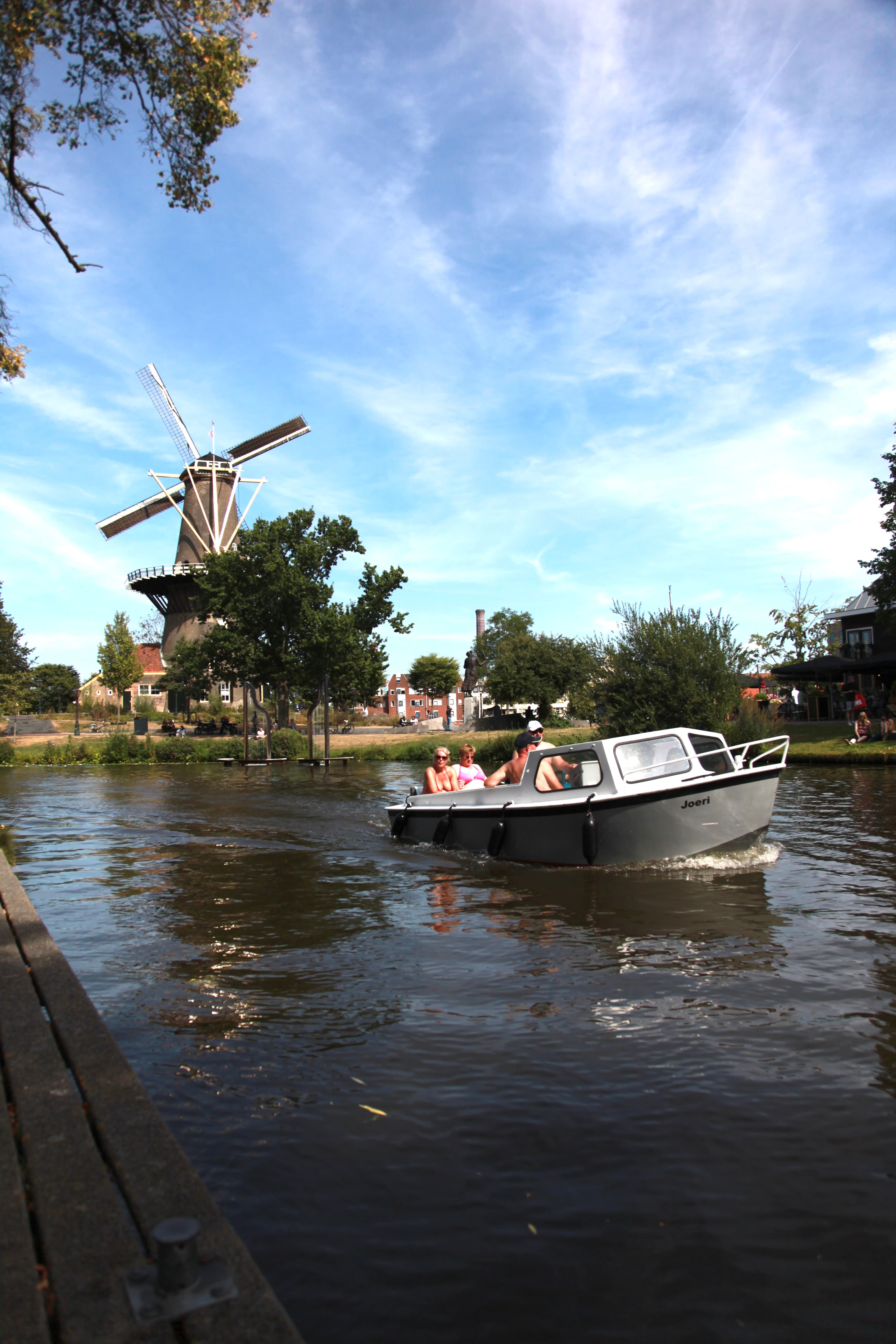 Windmill Canal Boat in Leiden