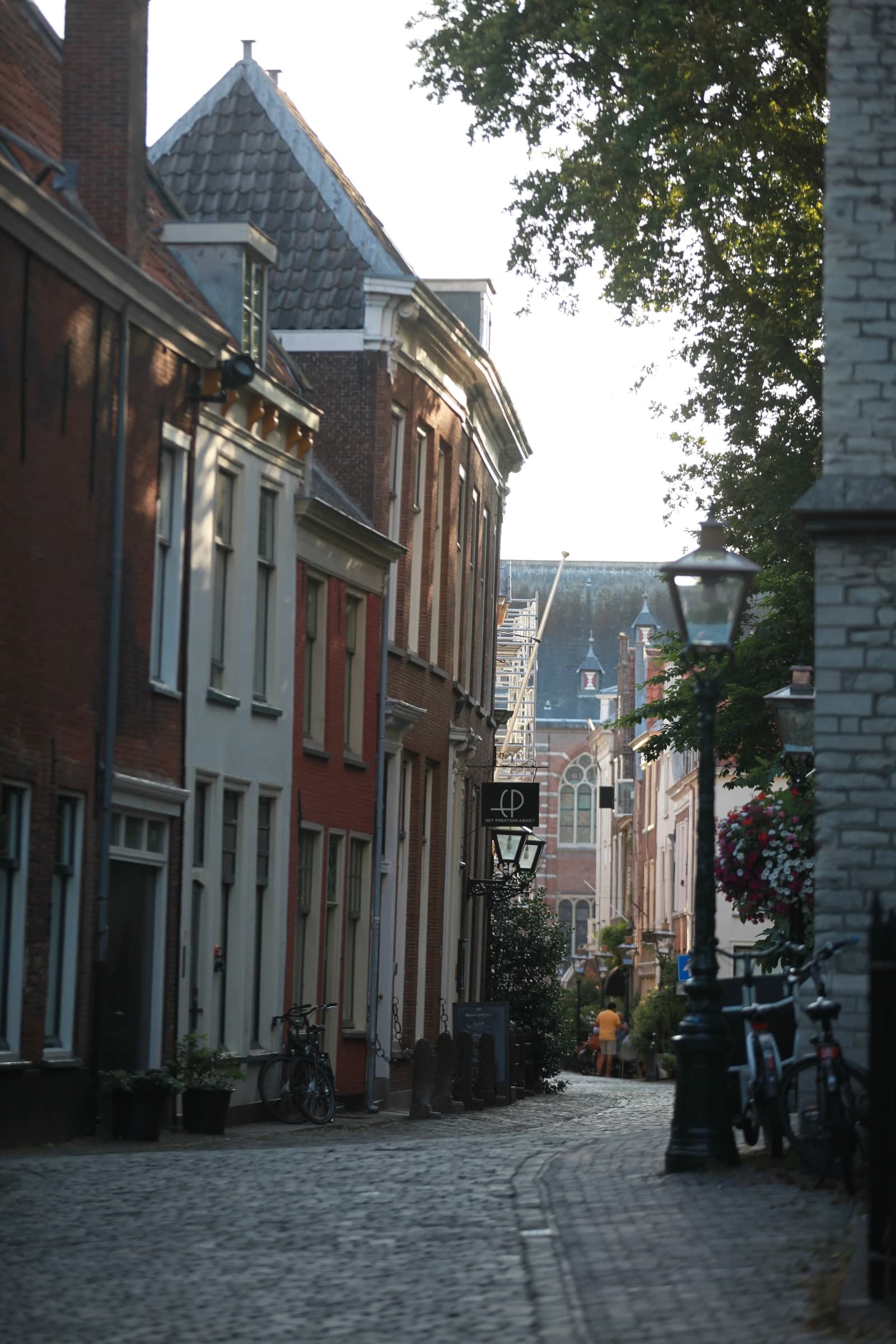 View towards a church along a narrow street in Leiden