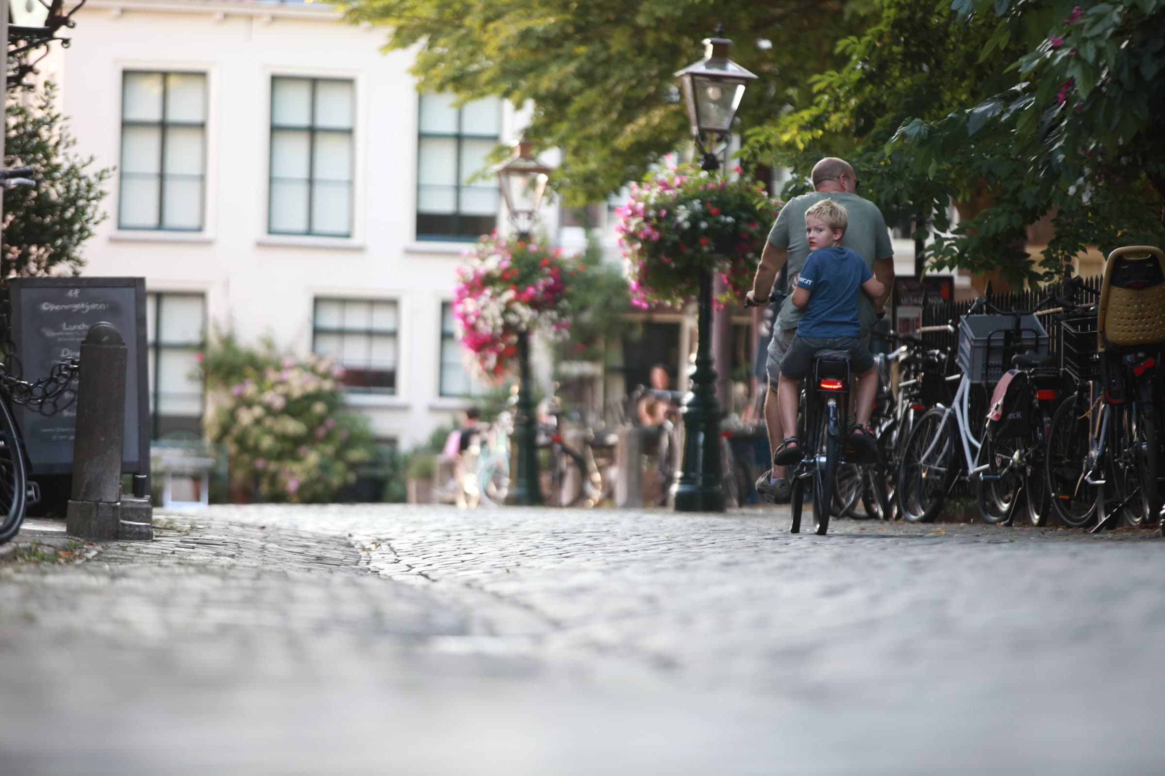 Cyclist on a cobbled street in Leiden