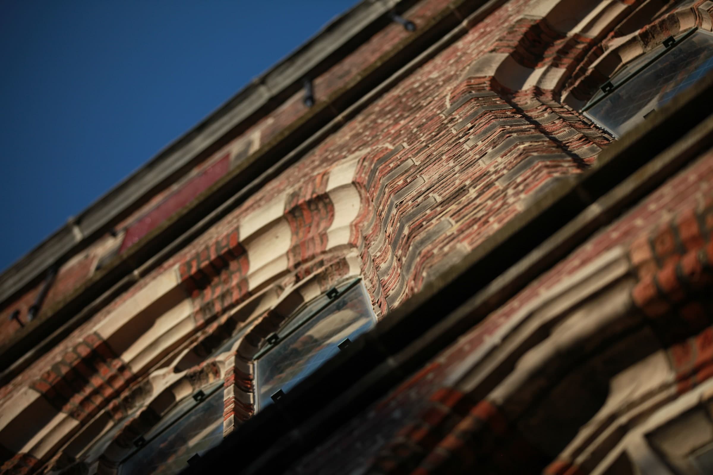 Sunlit brick church detail in Leiden