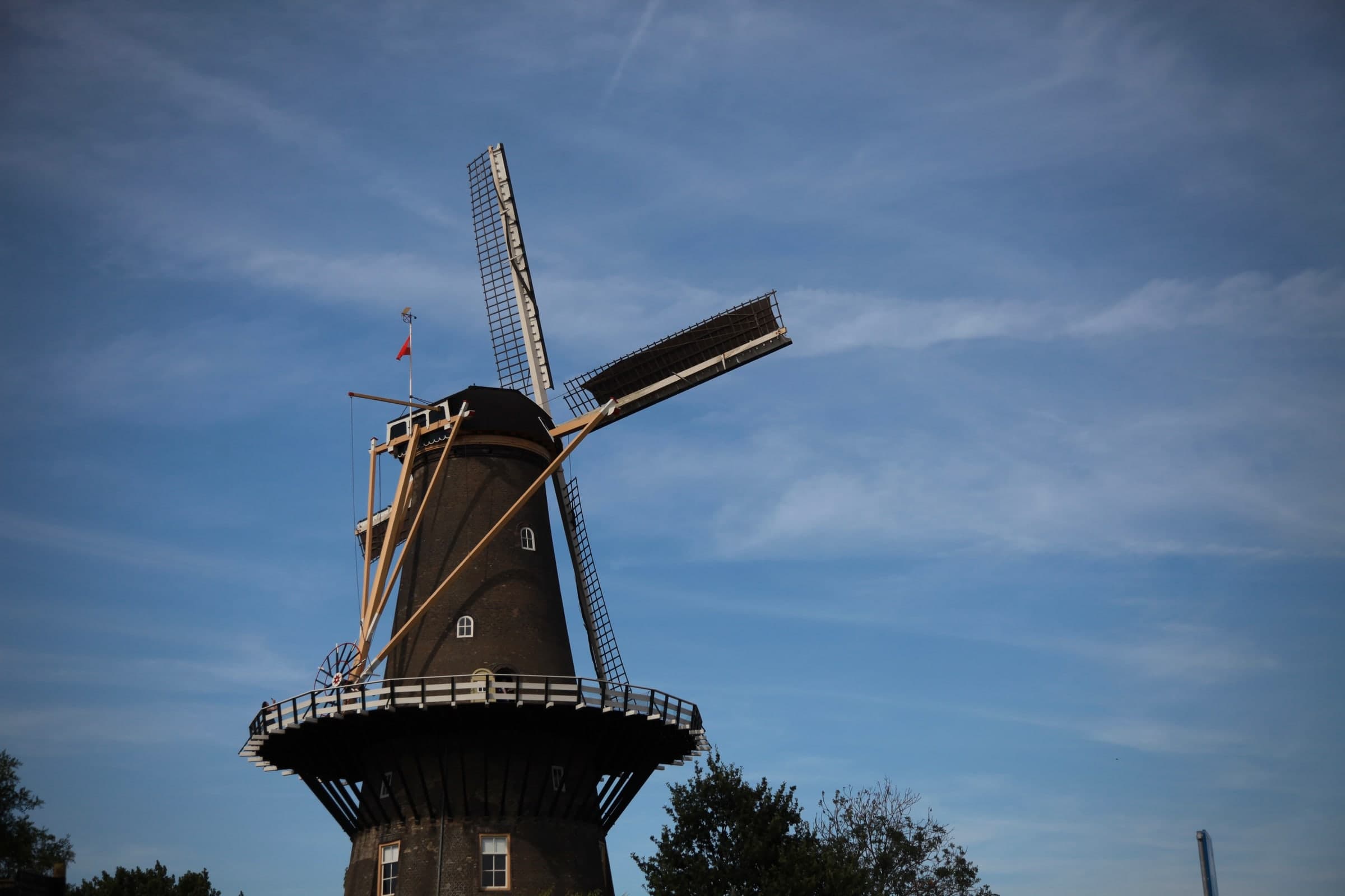 Molen De Valk beneath open sky in Leiden