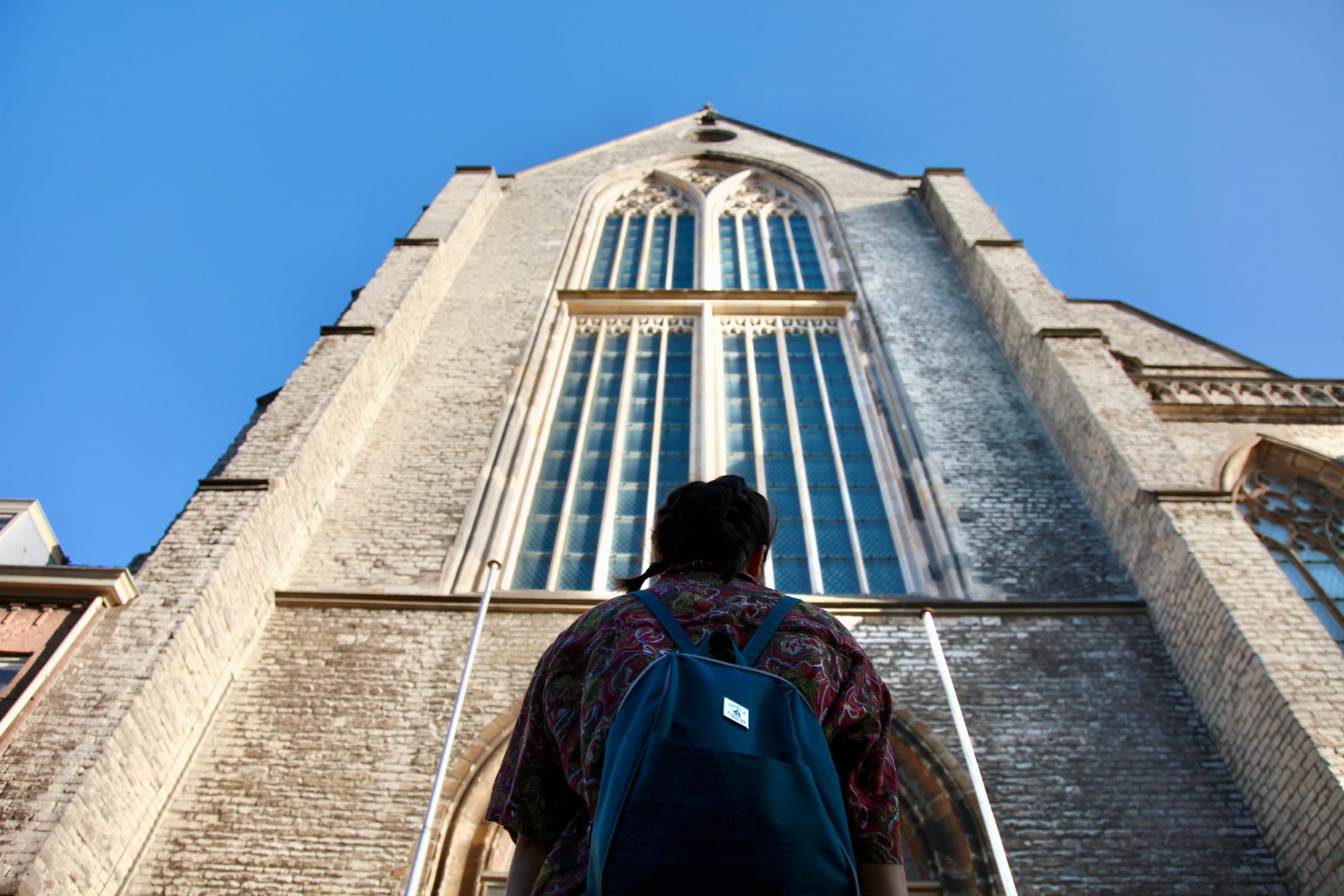 Visitor beneath Hooglandse Kerk in Leiden