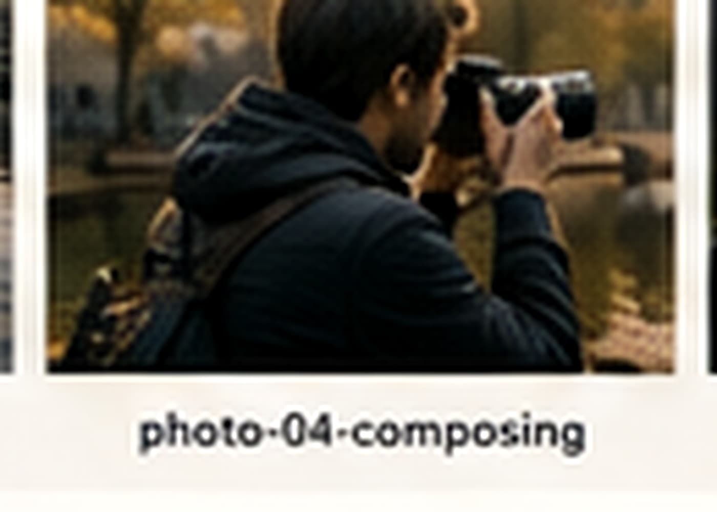 Traveller composing a photograph in historic Leiden